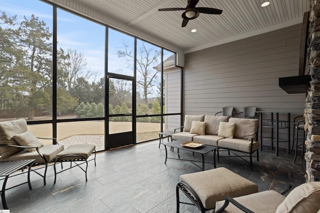 sunroom / solarium with ceiling fan