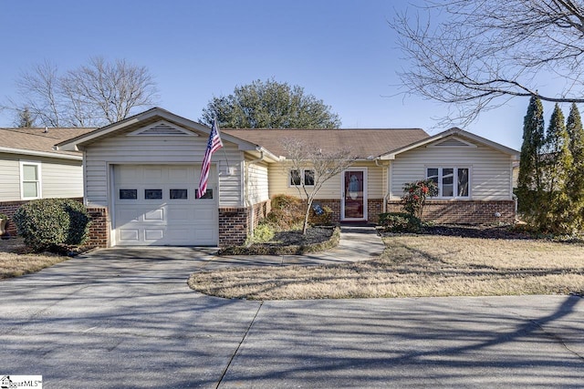 single story home featuring a garage