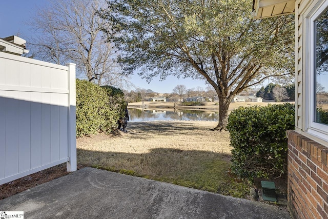 view of yard with a water view