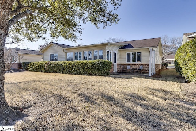 view of front of house with a front yard