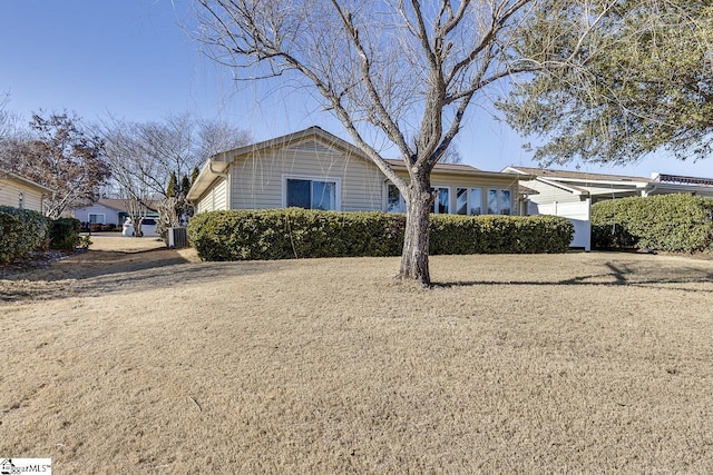 view of front of property featuring central AC unit