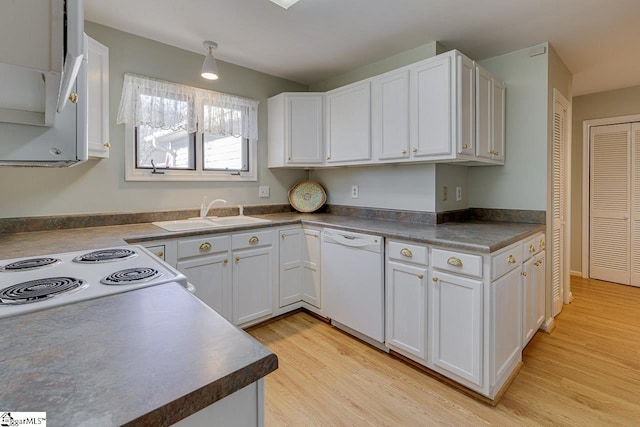 kitchen featuring white cabinetry, sink, light hardwood / wood-style flooring, and dishwasher