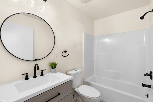 full bathroom with shower / bath combination, vanity, and toilet