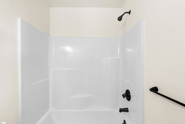 bathroom with shower / bath combination