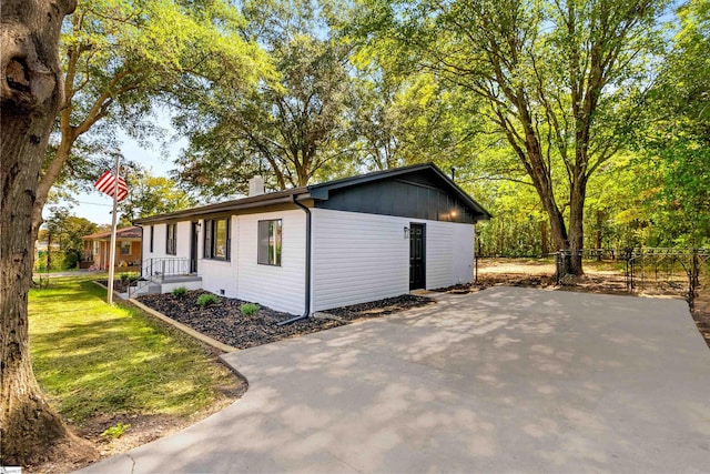 view of property exterior featuring a yard