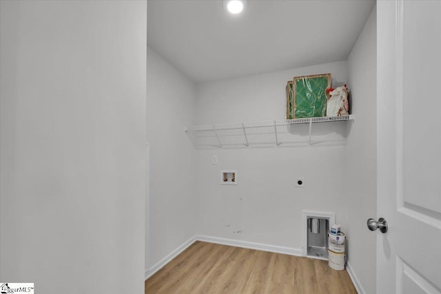 laundry room with washer hookup, light hardwood / wood-style floors, and hookup for an electric dryer