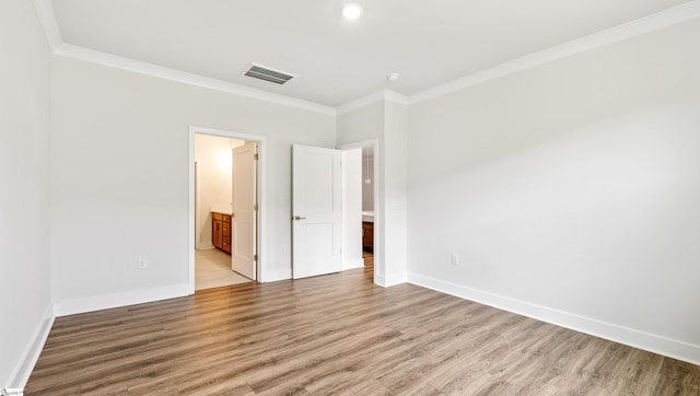 312 Fiery Rd Lot 0170, Mauldin, SC 29607 - unfurnished bedroom with ornamental molding, light wood-style flooring, baseboards, connected bathroom, and recessed lighting