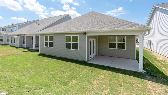 312 Fiery Rd Lot 0170, Mauldin, SC 29607 - back of house with a patio, a shingled roof, and a lawn