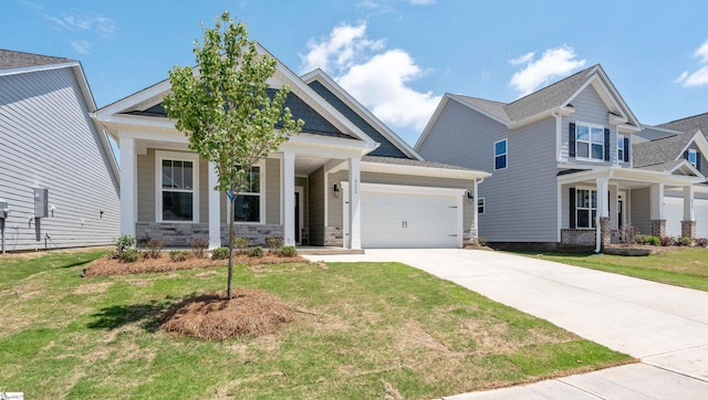 312 Fiery Rd Lot 0170, Mauldin, SC 29607 - craftsman inspired home with a porch, a garage, concrete driveway, and a front yard
