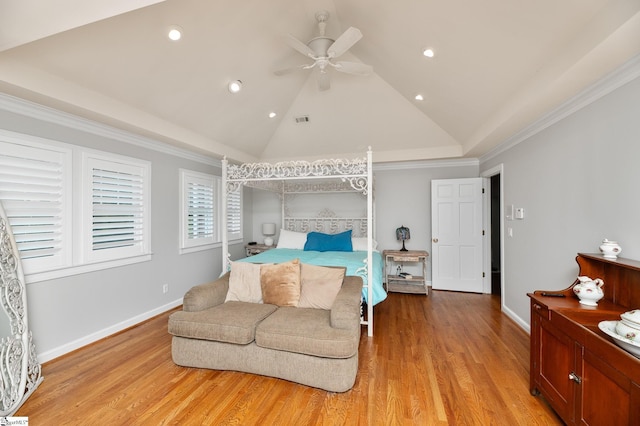 bedroom featuring crown molding, ceiling fan, lofted ceiling, and light hardwood / wood-style floors