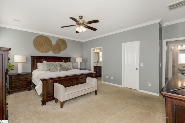 carpeted bedroom with ceiling fan, ensuite bath, and ornamental molding