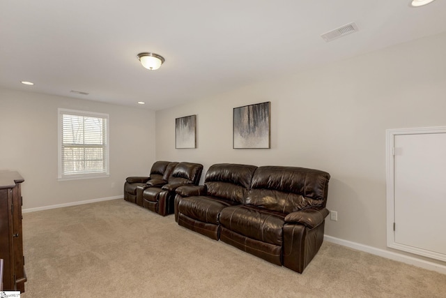 cinema room with light carpet