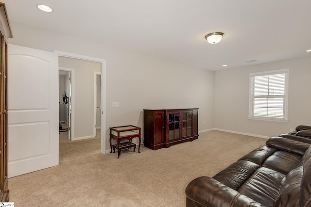 living room with light colored carpet