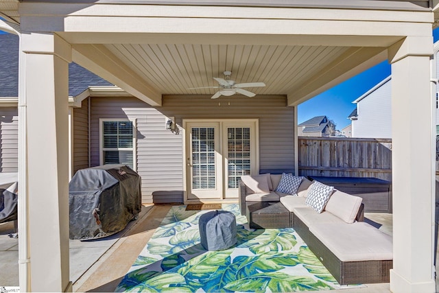 view of patio / terrace with grilling area, an outdoor hangout area, and ceiling fan