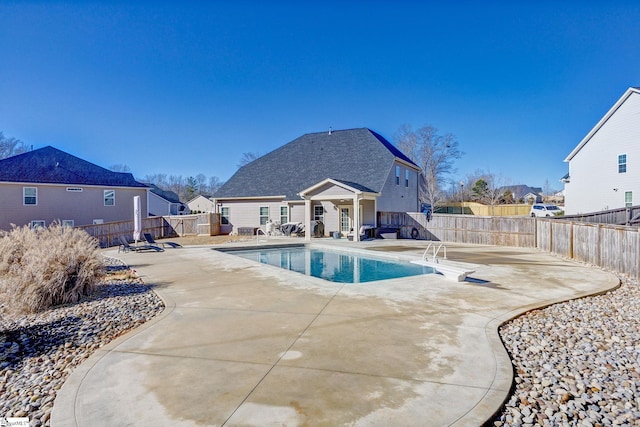 view of swimming pool featuring a patio area