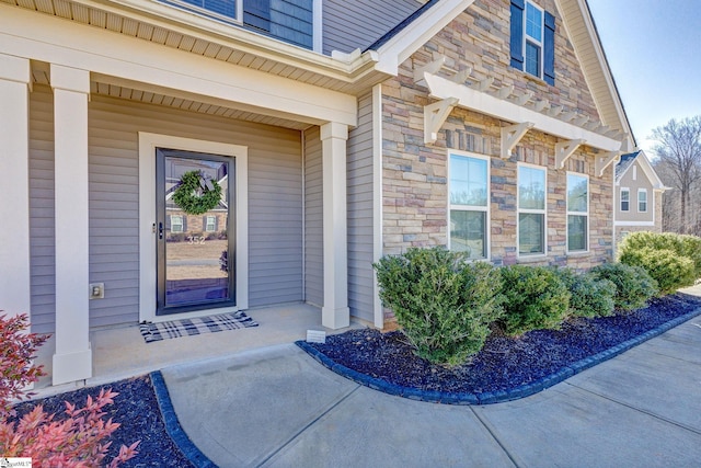 doorway to property with covered porch