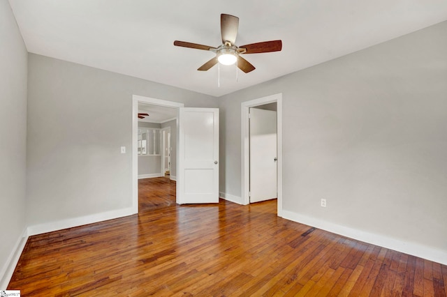 unfurnished bedroom with hardwood / wood-style floors and ceiling fan