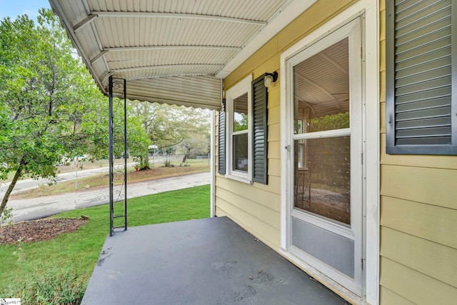 view of patio featuring a porch