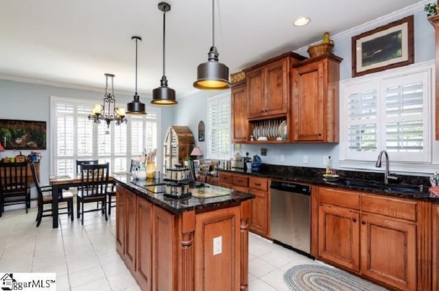 kitchen featuring hanging light fixtures, dishwasher, a center island, and sink