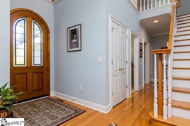 foyer with light hardwood / wood-style flooring