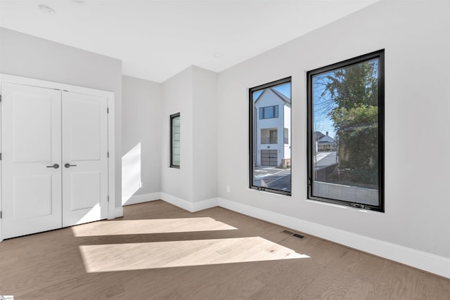 empty room featuring light wood-type flooring