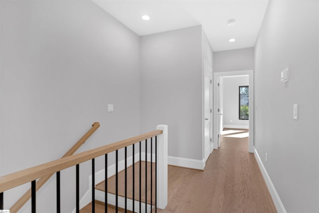 hall with light hardwood / wood-style flooring