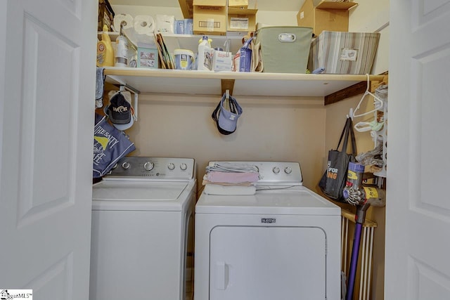 laundry room with washing machine and dryer