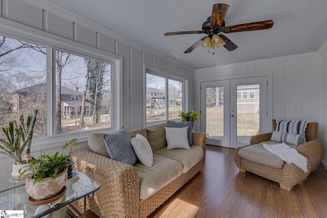 sunroom featuring french doors and ceiling fan