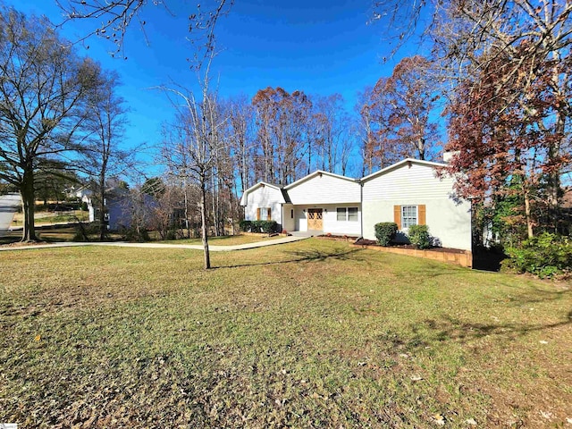 exterior space featuring a front lawn