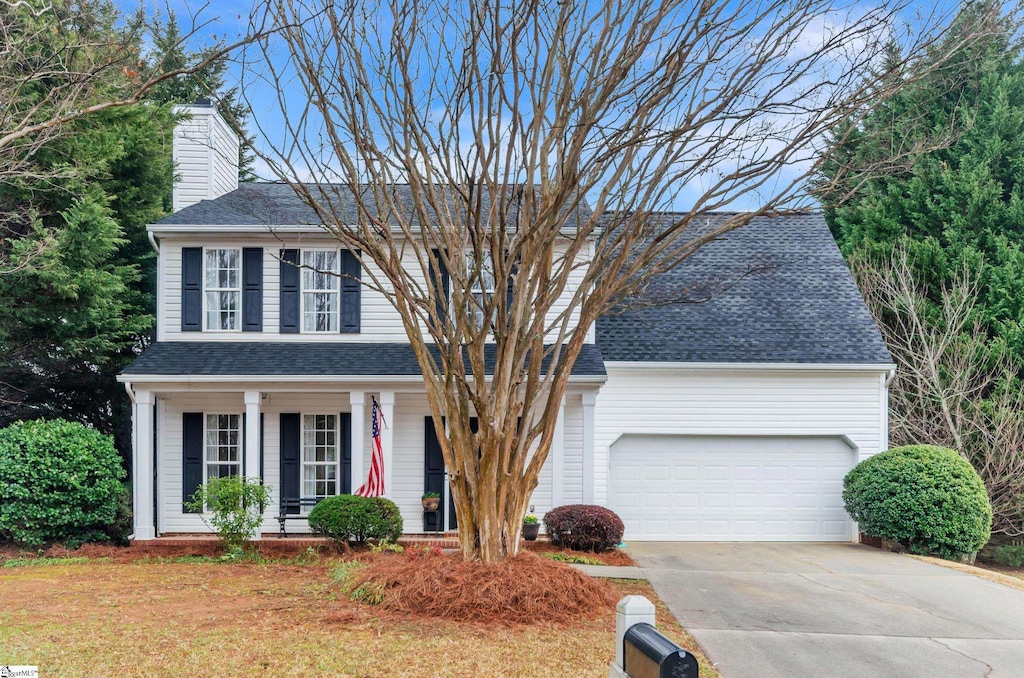 view of front of property featuring a garage