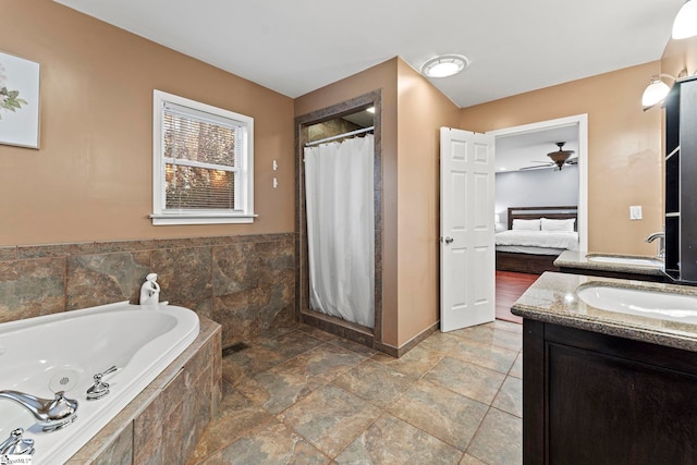 bathroom featuring vanity and plus walk in shower