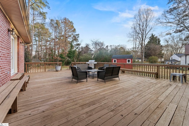 wooden terrace with a storage shed