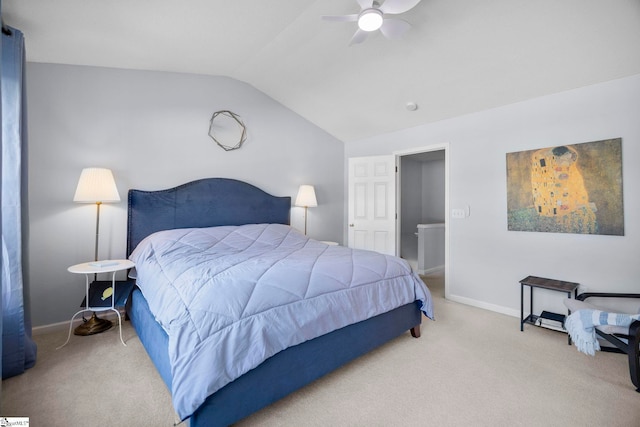 carpeted bedroom with lofted ceiling and ceiling fan