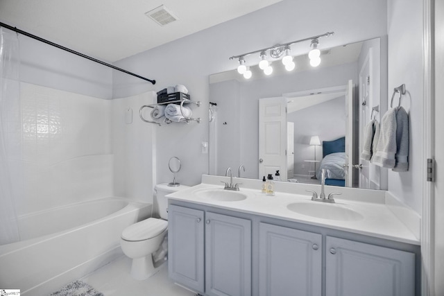 full bathroom with shower / bathtub combination, vanity, and toilet