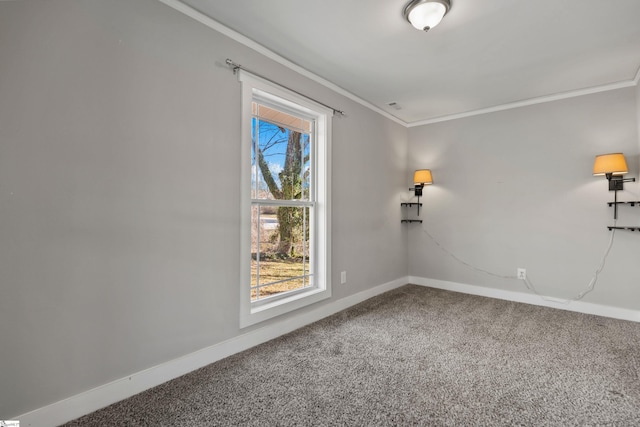 spare room featuring crown molding and carpet flooring