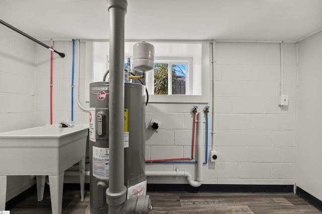 utility room featuring electric water heater