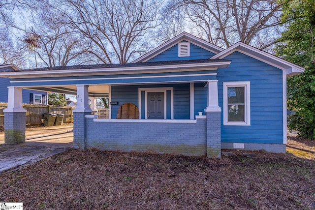 bungalow-style home with a porch