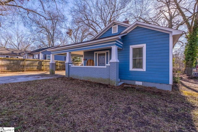 bungalow-style home featuring a porch