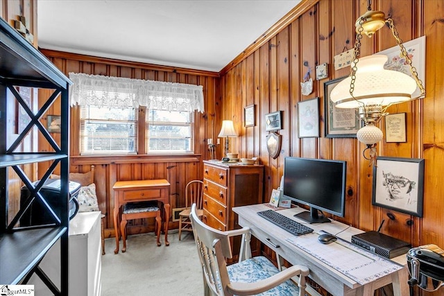 carpeted home office with wood walls