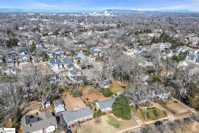 birds eye view of property featuring a mountain view