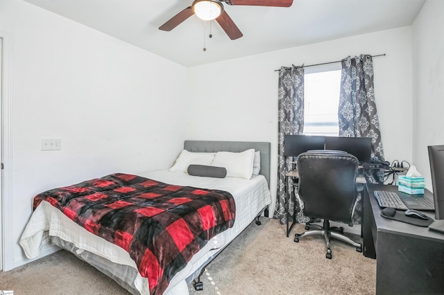 bedroom with light colored carpet and ceiling fan