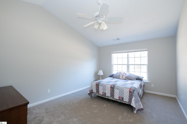 bedroom with lofted ceiling, carpet, and ceiling fan