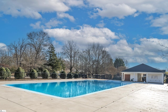 view of swimming pool featuring a patio area