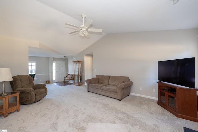 carpeted living room featuring vaulted ceiling and ceiling fan