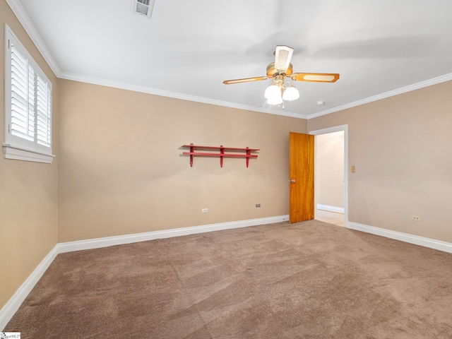 carpeted empty room with ornamental molding and ceiling fan