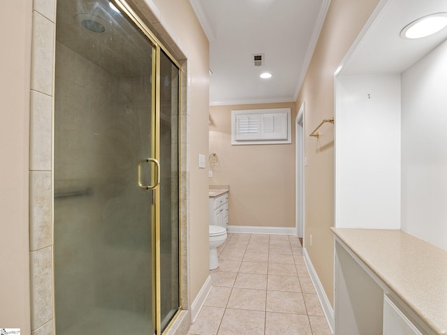 bathroom featuring tile patterned floors, ornamental molding, an enclosed shower, and vanity