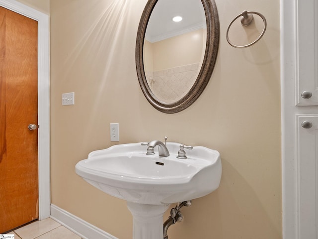 bathroom featuring crown molding and tile patterned floors