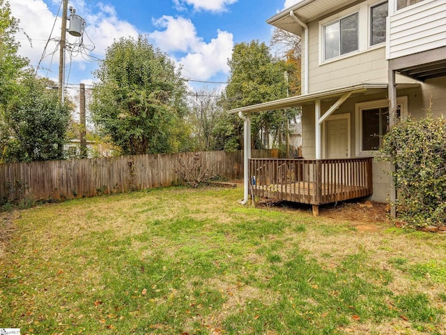 view of yard featuring a wooden deck