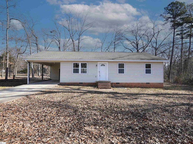 view of front of house with a carport