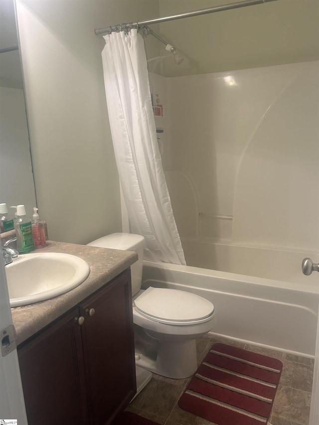 full bathroom featuring toilet, vanity, shower / bathtub combination with curtain, and tile patterned flooring